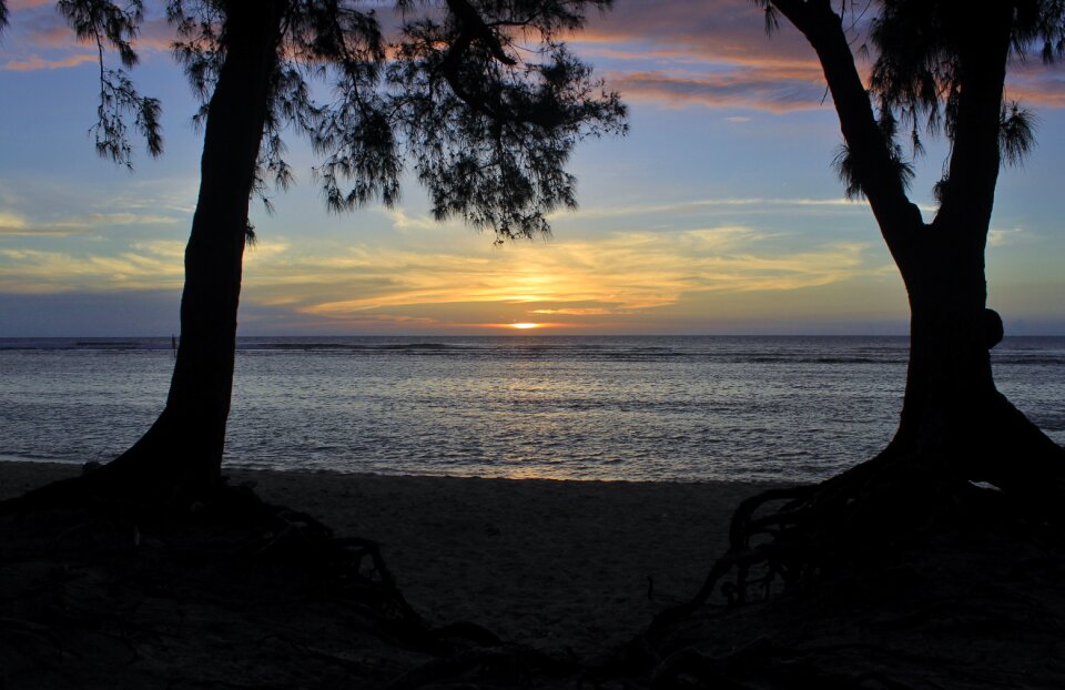 Sunset meeting ocean