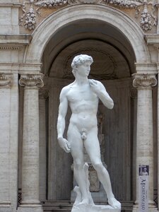 Statue naked man photo