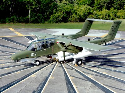 Ov-10d bronco tarmac trees