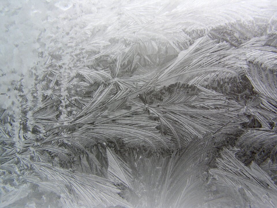 Icing winter window frost on the window photo