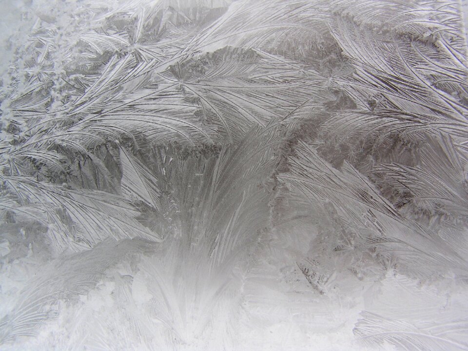 Icing winter window frost on the window