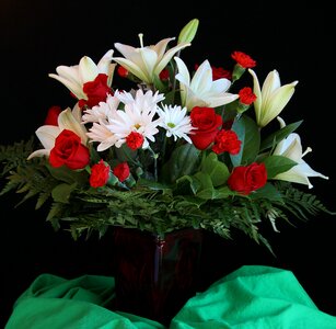 Roses lilies carnations photo