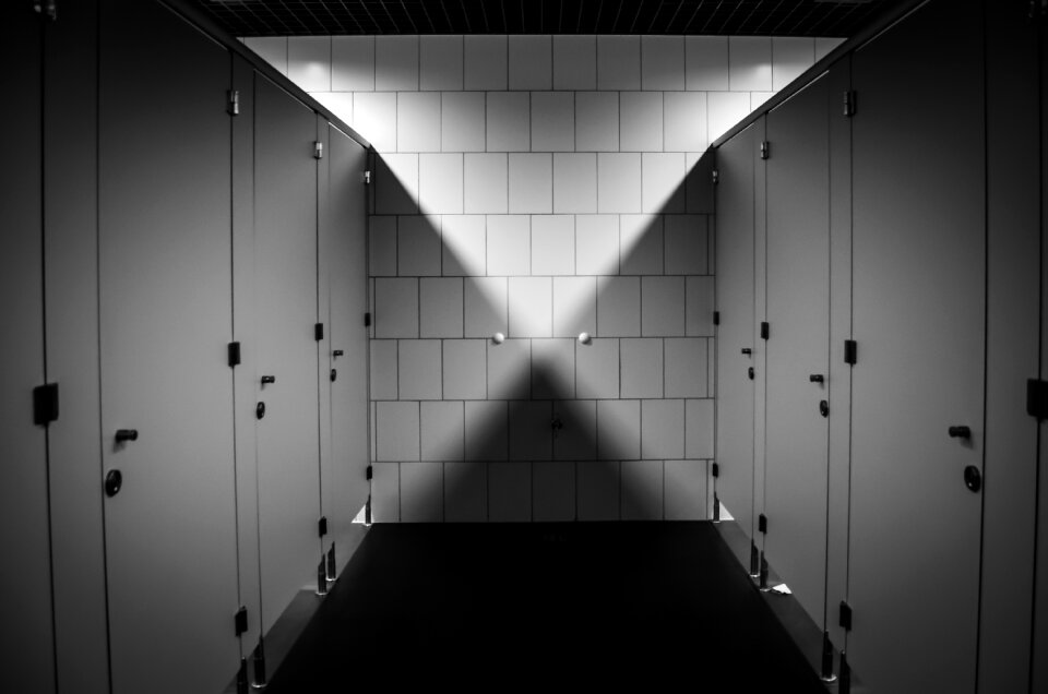 Public toilet bathroom shadow