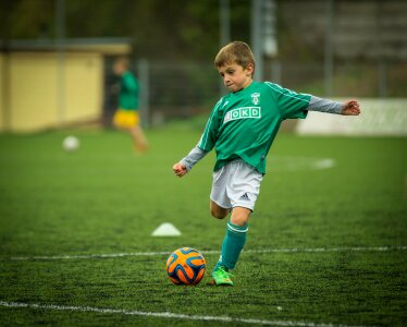 Kick footballer ball photo