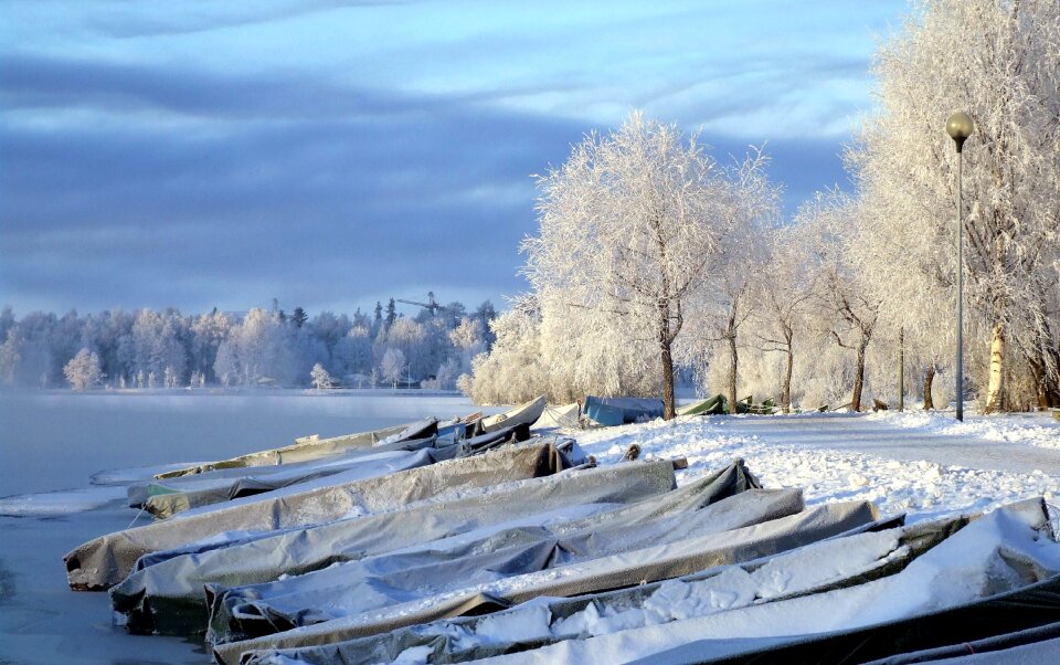 Boats frozen water photo