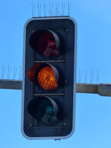 Traffic light signal yellow shining photo