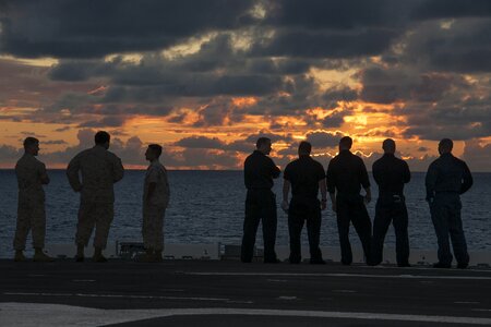 Military ship sunset