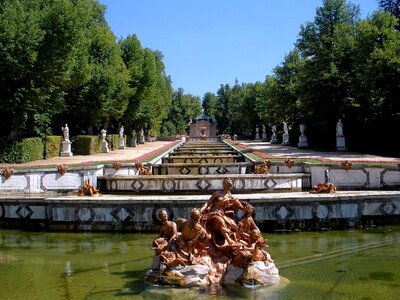 Pond sculptures trees photo