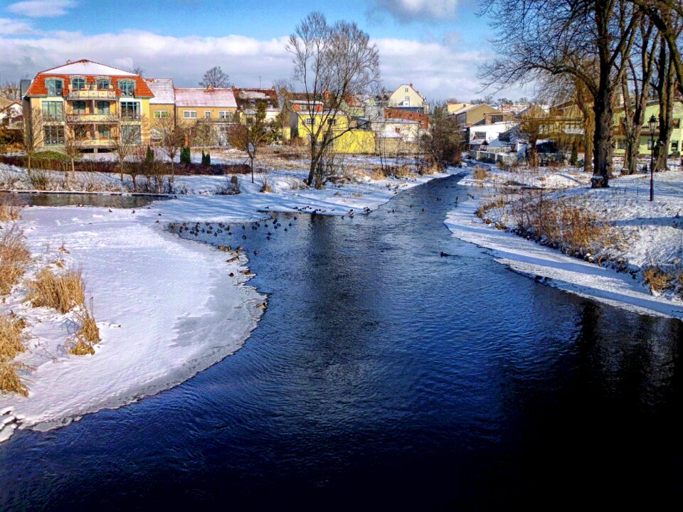 Buildings stream water photo