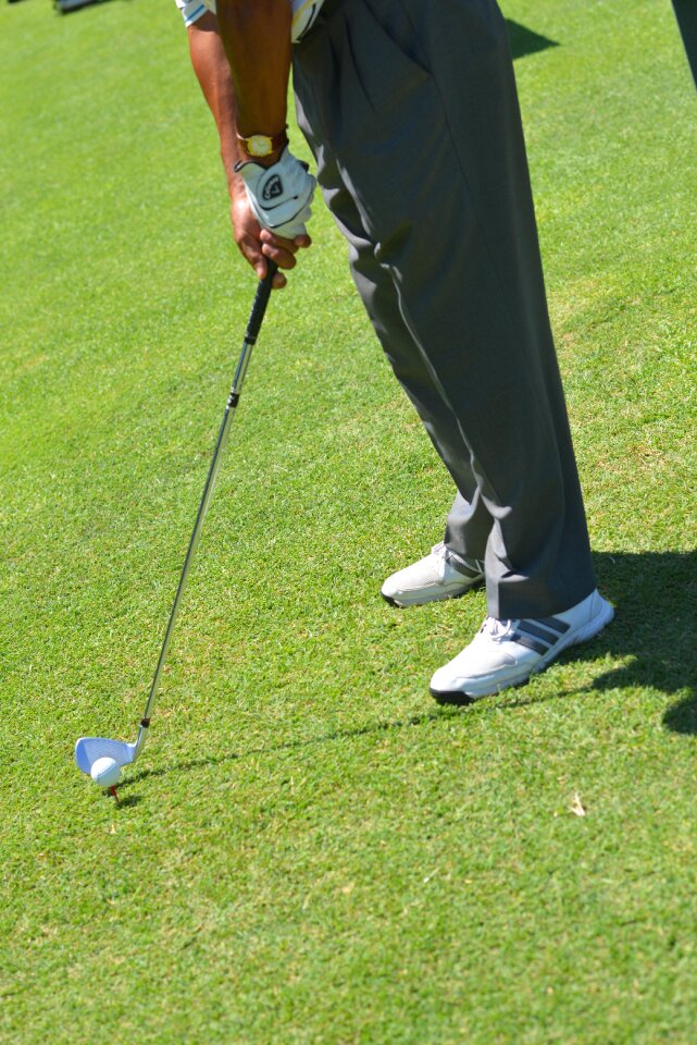 Green golfing man
