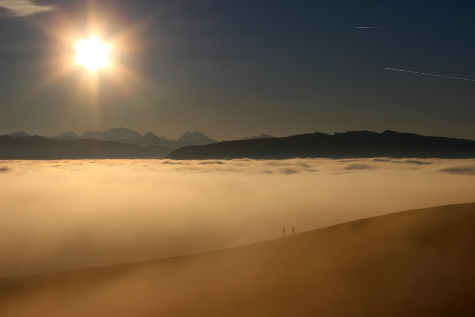 Sun people in the sea of fog mountain landscape