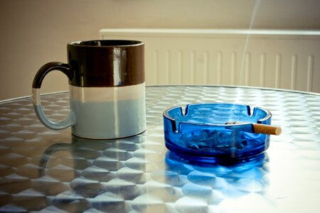 Cigarette cup table photo