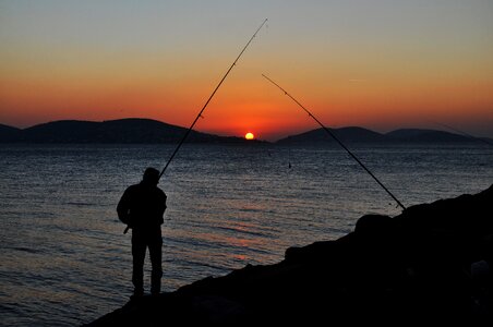 Sunset fishing rod fisherman photo