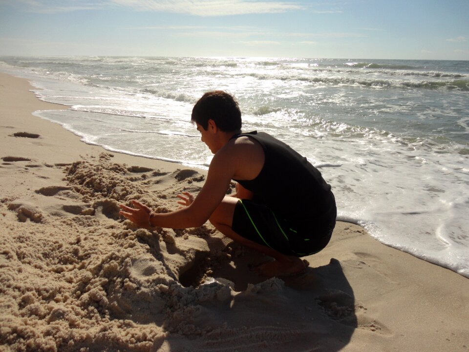 Beach boy sand