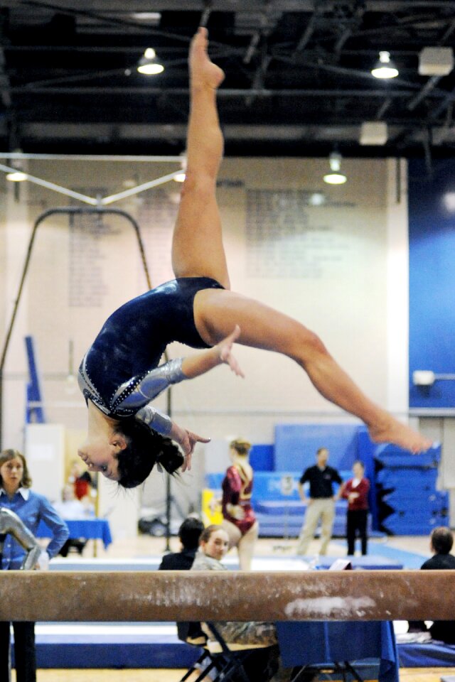 Balance beam flip