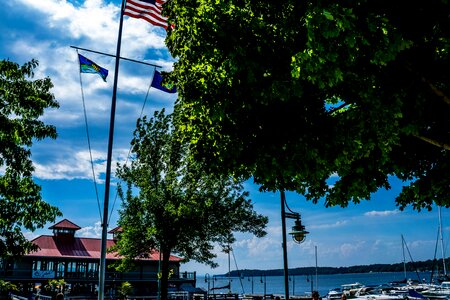 Flags boats jetty photo