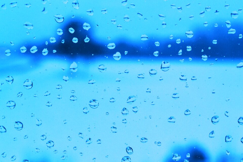 Glass drop of water out of focus