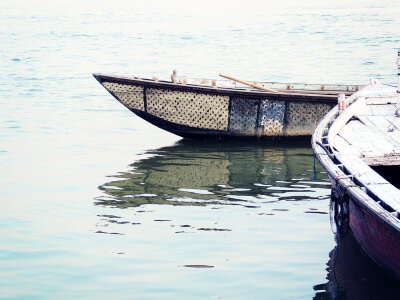 Water reflection rowboat photo