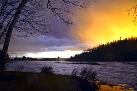 Frozen lake winter landscape end of the day