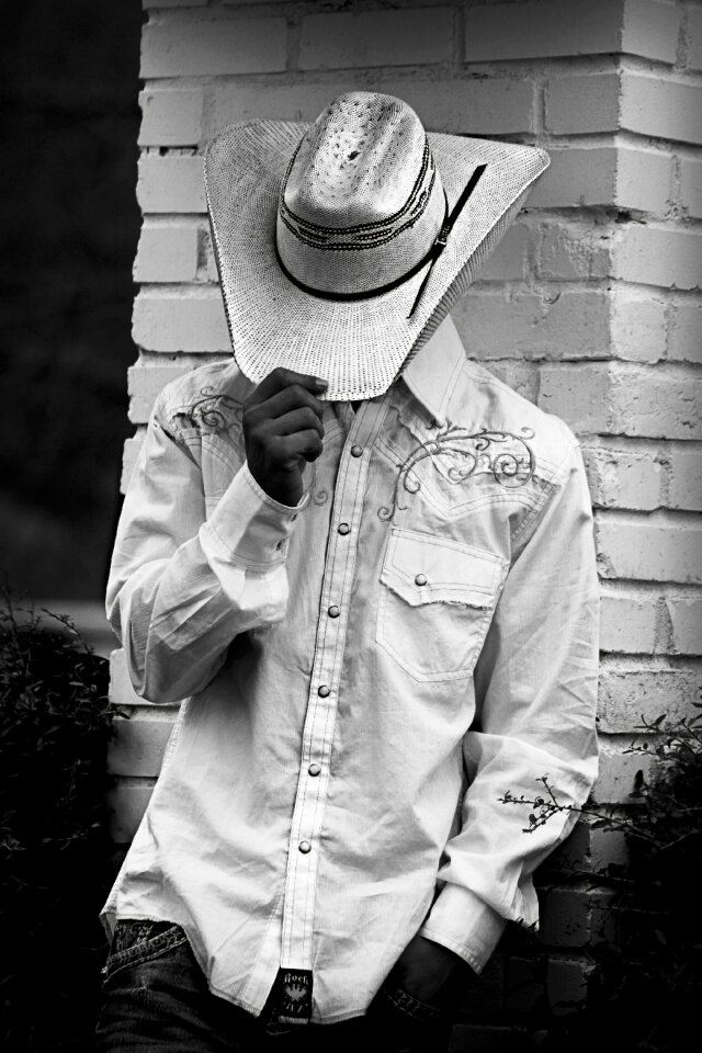 Hat man standing