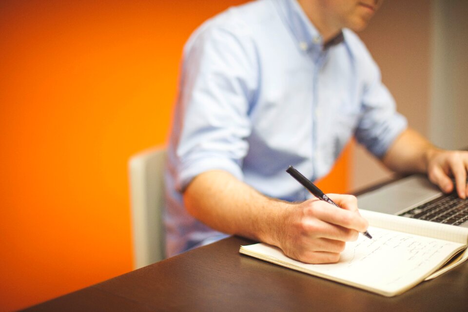 Home office businessman notebook