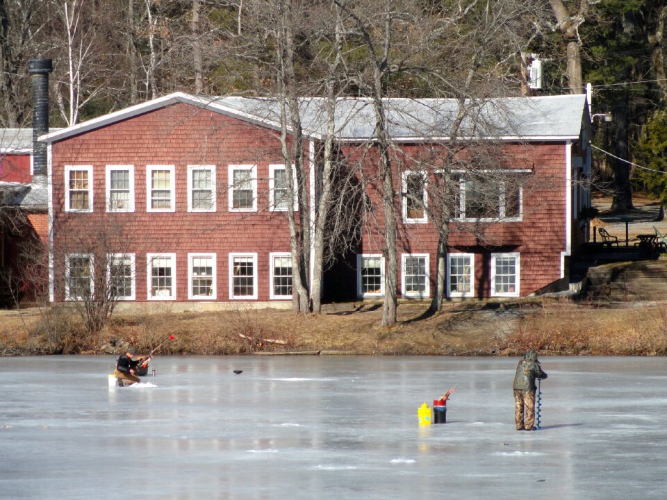 Frozen men ice fishing