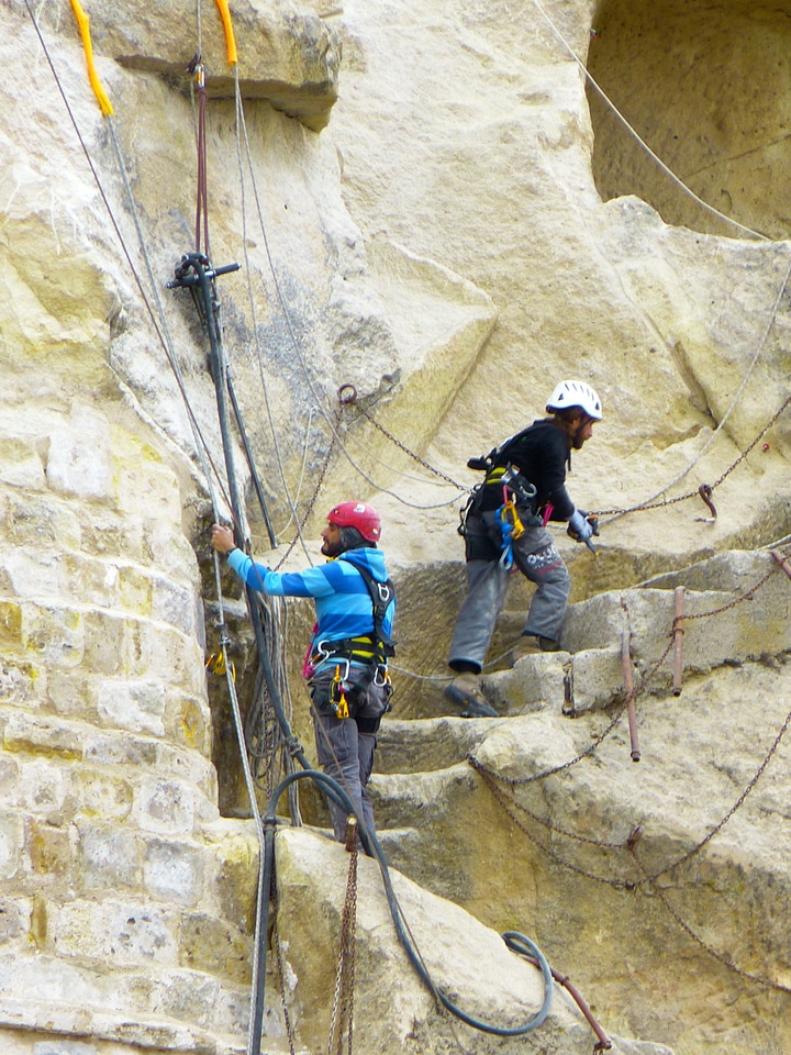 Men workers steel cable