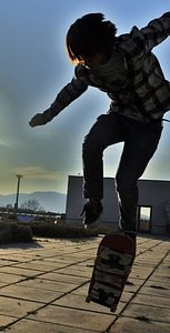 Skateboarding trick skateboarding jump ollie photo