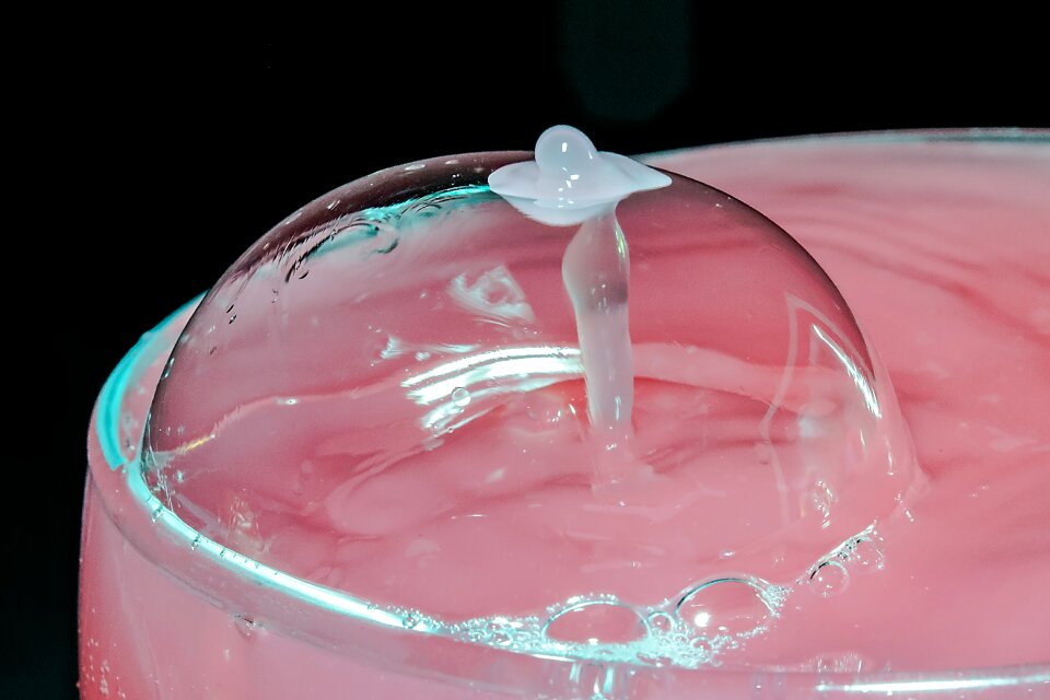 Coloured water droplets spray splash