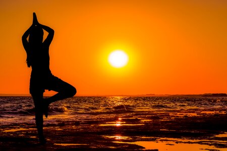 Yoga sunset beach girl