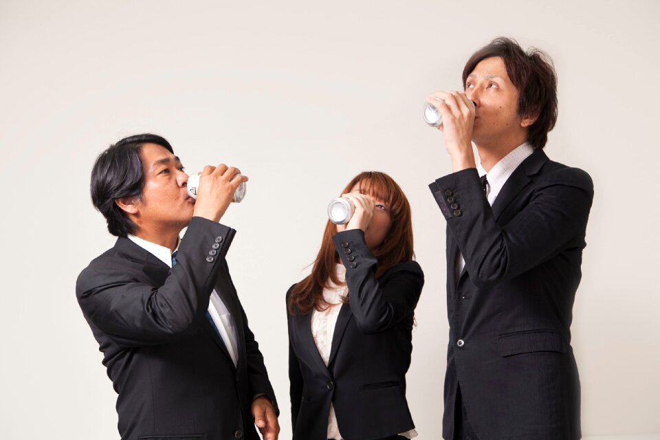 Business team drinking beer