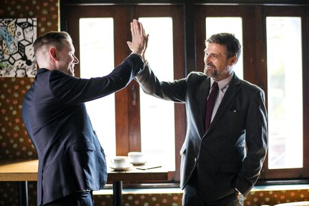 Businessmen high five