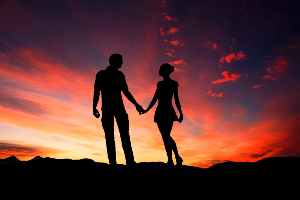 Couple silhouette sunset photo