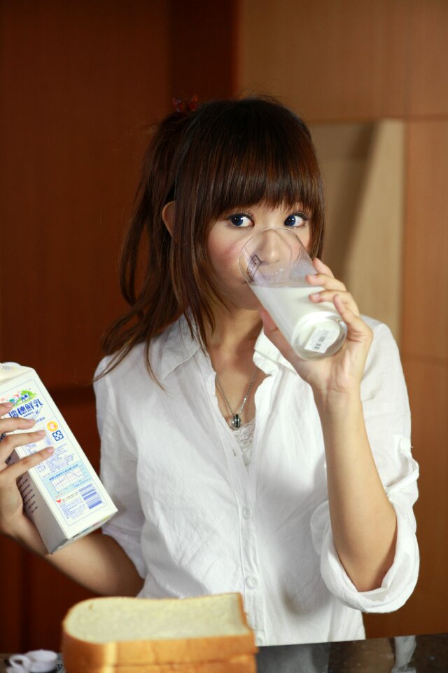Woman girl drink milk