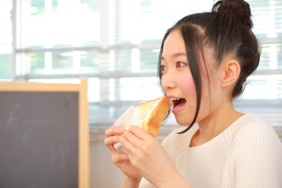 Woman girl eating toast