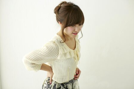 Woman low back pain