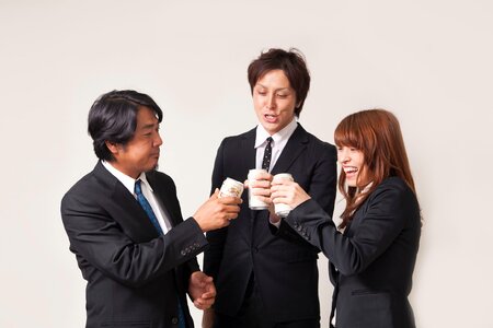 Business team drinking beer