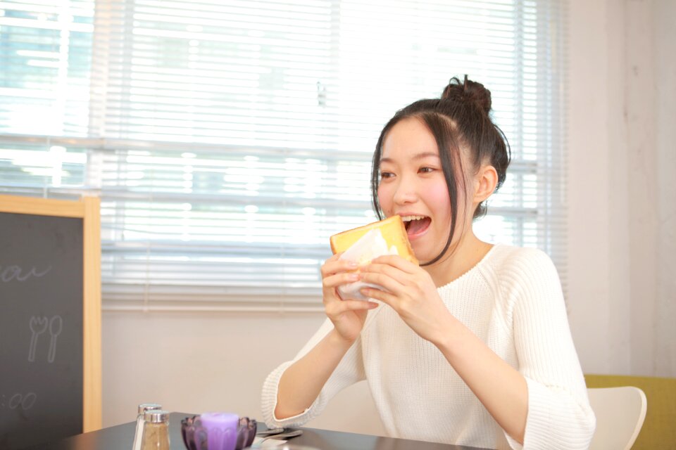 Woman girl eating toast