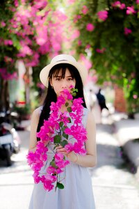 Woman girl portrait flower photo
