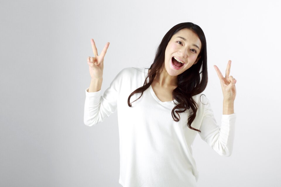 Woman girl v sign