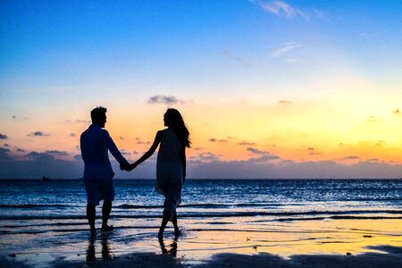 Sunset beach couple photo
