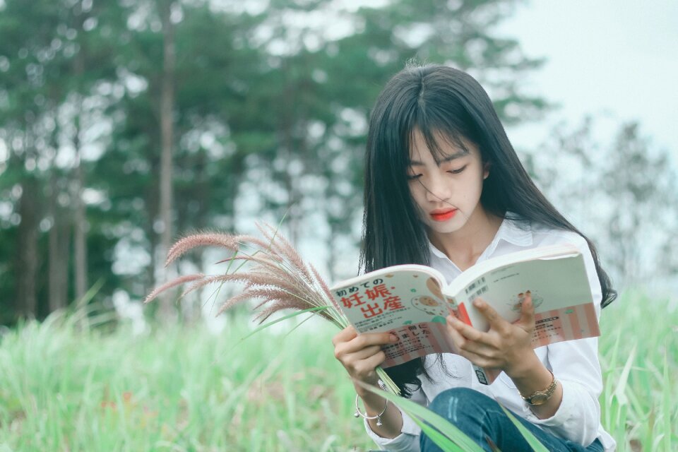 Woman girl reading book