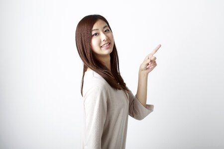 Woman girl pointing finger photo