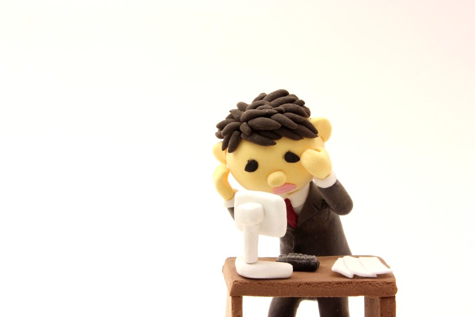 Business man troubled doll