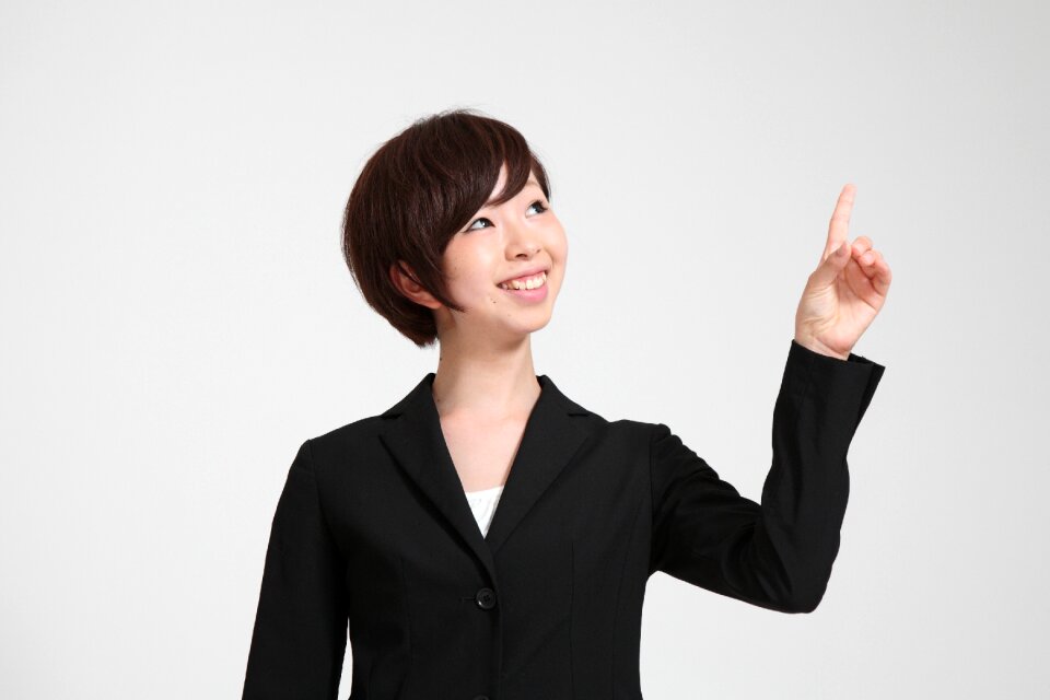 Business woman pointing finger