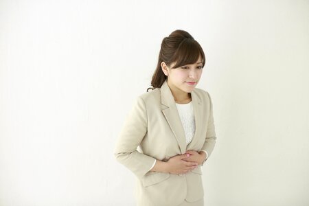 Business woman stomachache photo