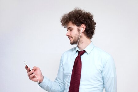 Businessman listening music