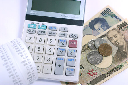 Calculator money receipt photo