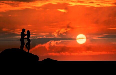 Couple sunrise silhouette photo