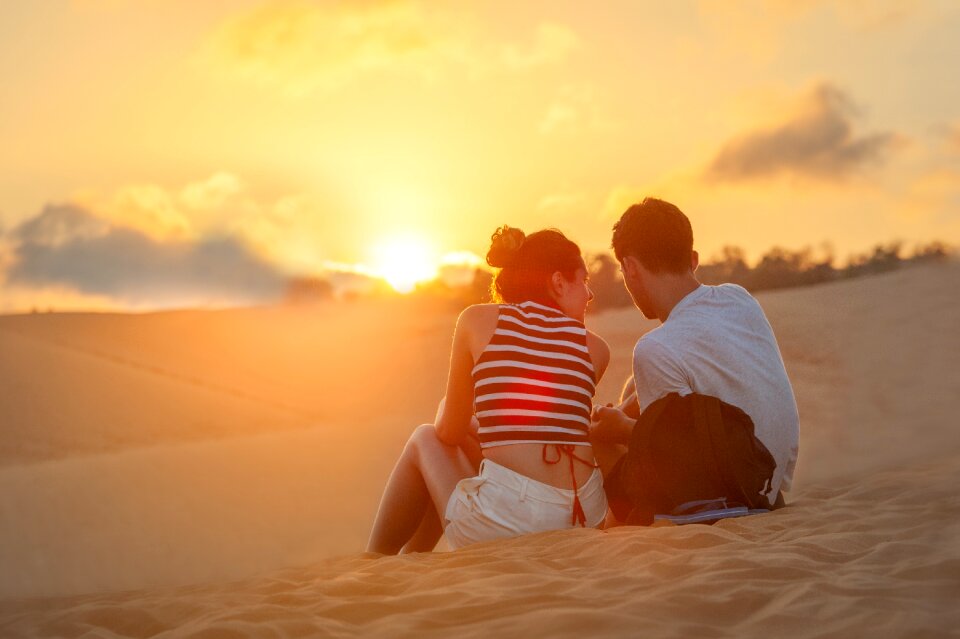 Couple sunset beach